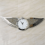 Silver studded diamond wing clock 140 × 42cm